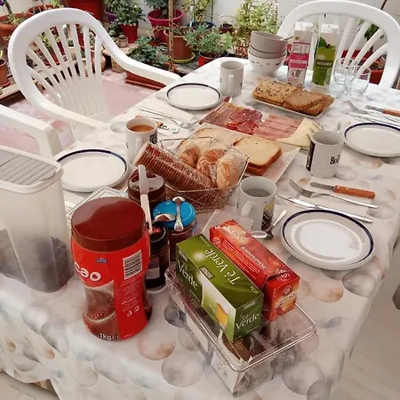 En Casa Проживание в семье